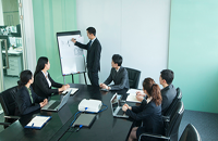 People listening to a presentation