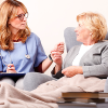 Doctor and elderly female patient